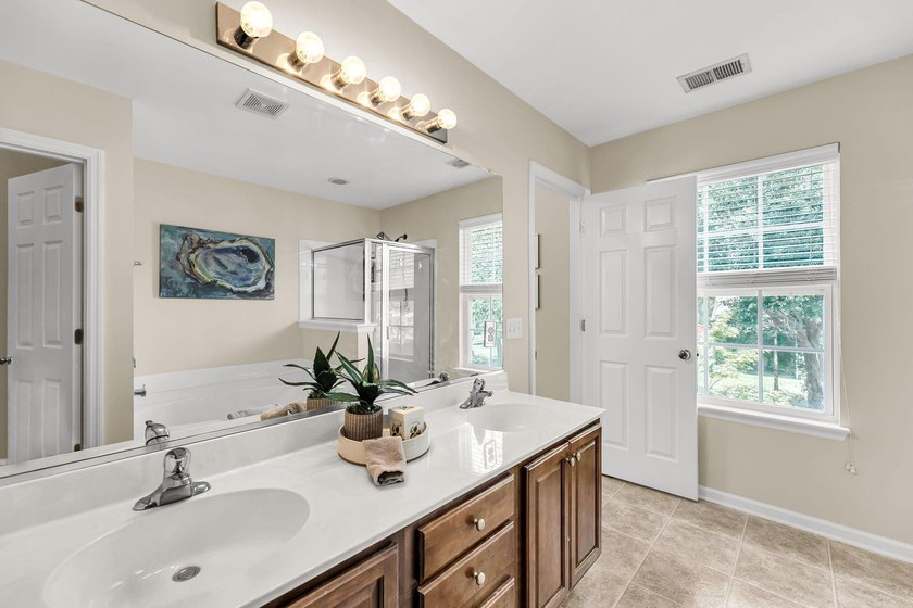 Welcome to The Gates at Fenwick Plantation! This move-in-ready - photo 14