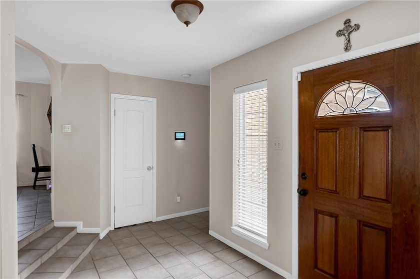 Welcome to this well-maintained 4-bedroom, 2-bath home in the - photo 6