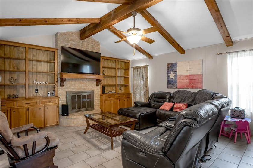 Welcome to this well-maintained 4-bedroom, 2-bath home in the - photo 7