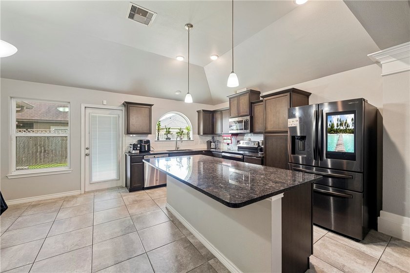 Welcome to 2218 Spoonbill, a move-in ready gem on the desirable - photo 7