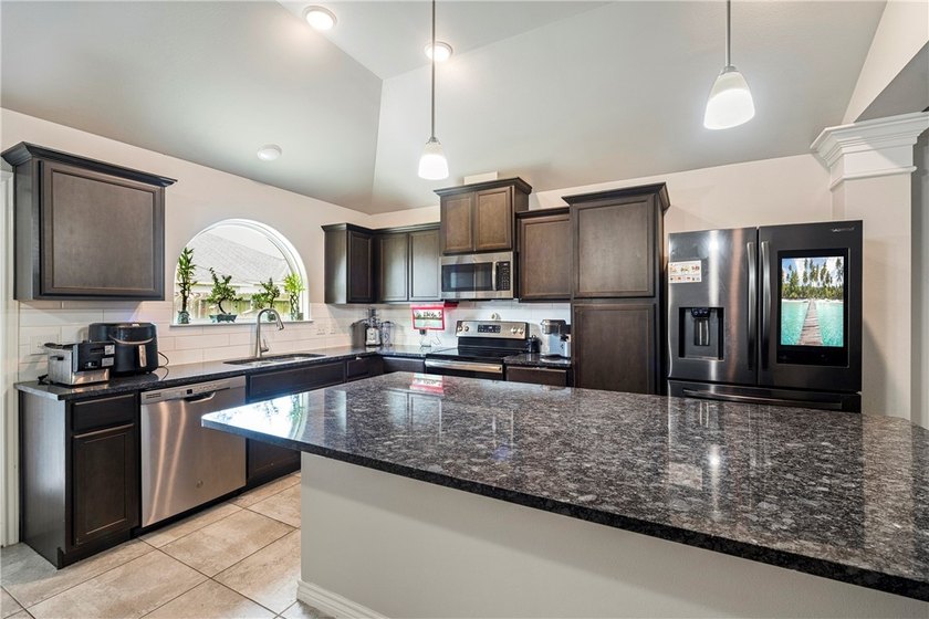 Welcome to 2218 Spoonbill, a move-in ready gem on the desirable - photo 9