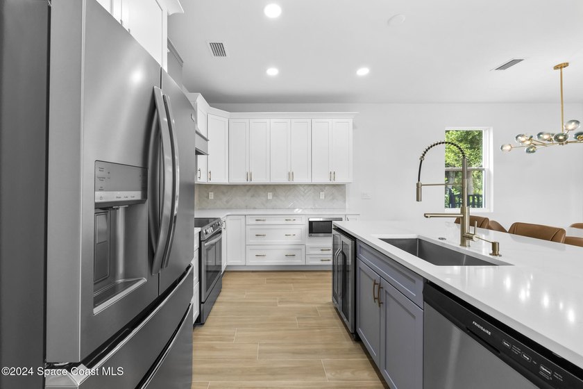 Experience modern luxury and effortless downtown living in this - photo 11