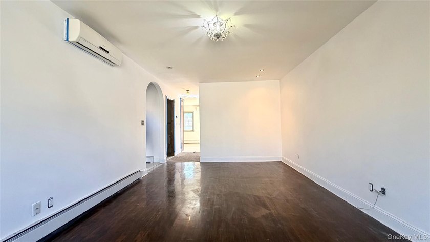 This charming one-family home offers three bedrooms, two and a - photo 5