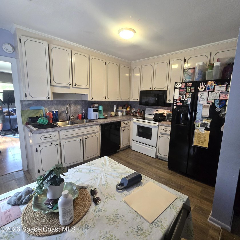Home with good bones and newer systems on a large oversized - photo 3