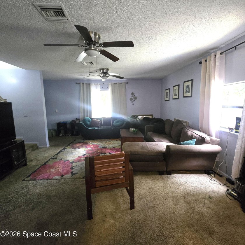 Home with good bones and newer systems on a large oversized - photo 9