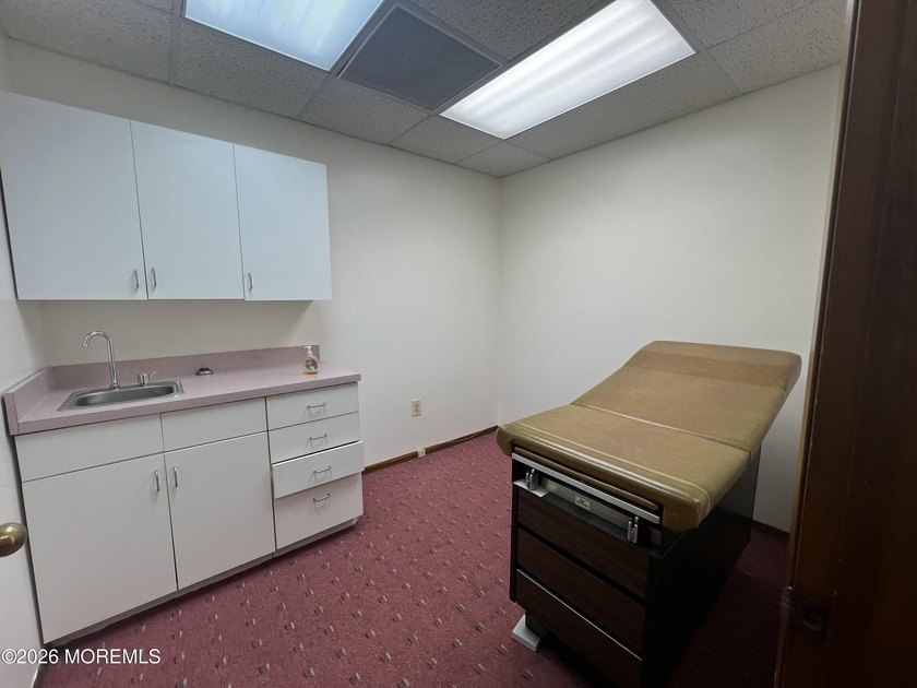 Available a one-story end unit office condo. The unit features - photo 11