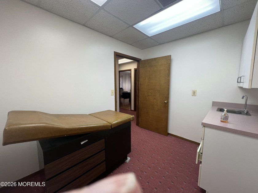 Available a one-story end unit office condo. The unit features - photo 12