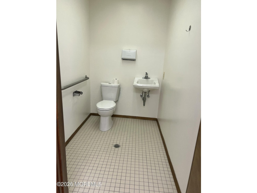 Available a one-story end unit office condo. The unit features - photo 14