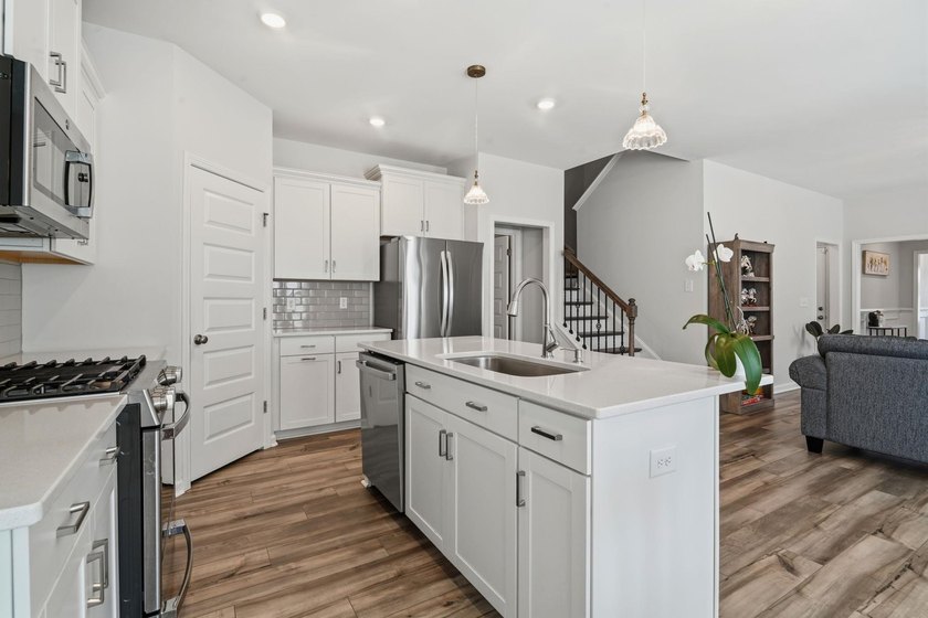 Built in 2024 on a private, wooded homesite with natural - photo 15