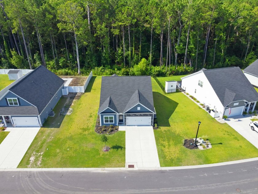 Built in 2024 on a private, wooded homesite with natural - photo 37