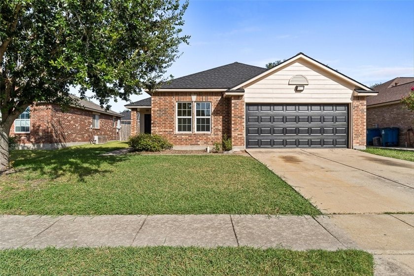 Welcome home to this beautifully maintained 4-bedroom, 2-bath - photo 2