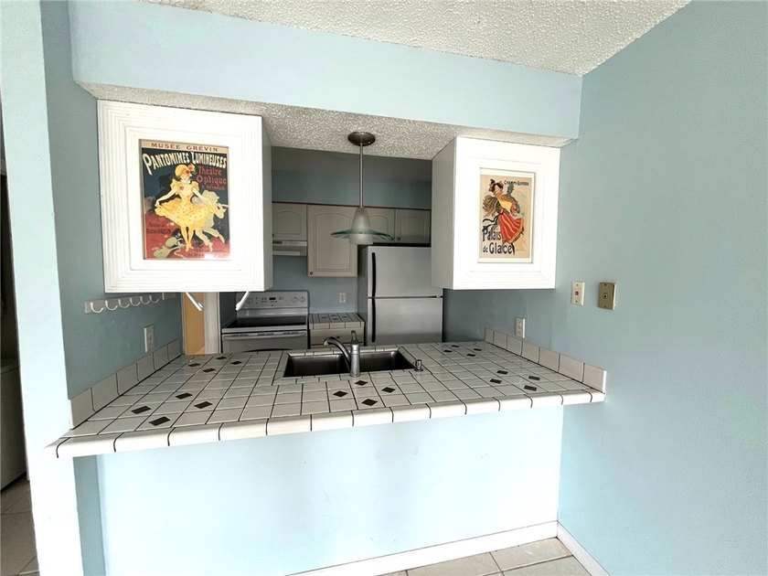 This WATERFRONT condo is a blank canvas to add your personal - photo 3