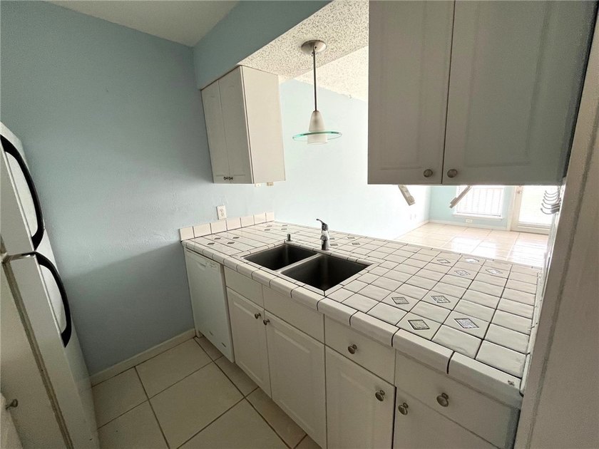 This WATERFRONT condo is a blank canvas to add your personal - photo 4