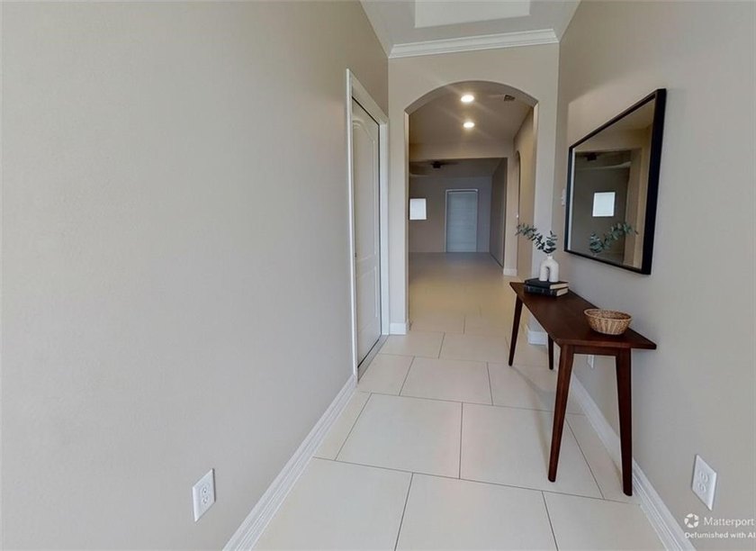 Hidden away in a quiet, private and gated community, you'll find - photo 2