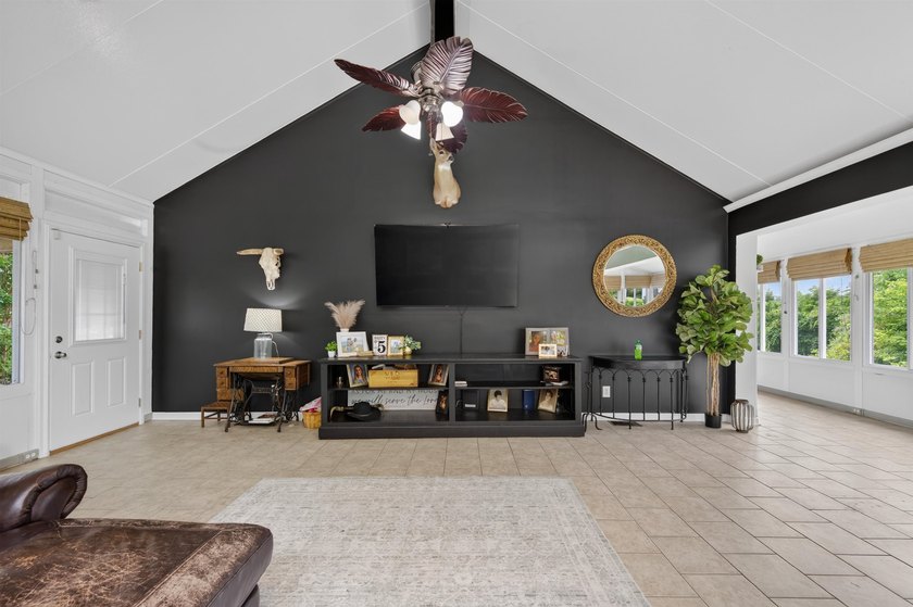 Welcome Home! This charming 1.5-story bungalow is situated on a - photo 14