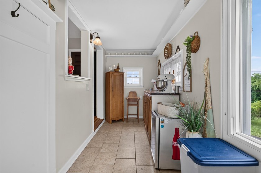 Welcome Home! This charming 1.5-story bungalow is situated on a - photo 17