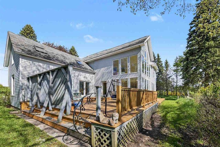 VIEWS! Stunning Lake Charlevoix views on a 1+ acre property - photo 2