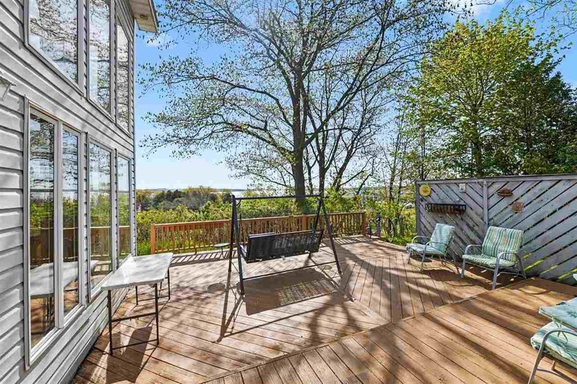 VIEWS! Stunning Lake Charlevoix views on a 1+ acre property - photo 6