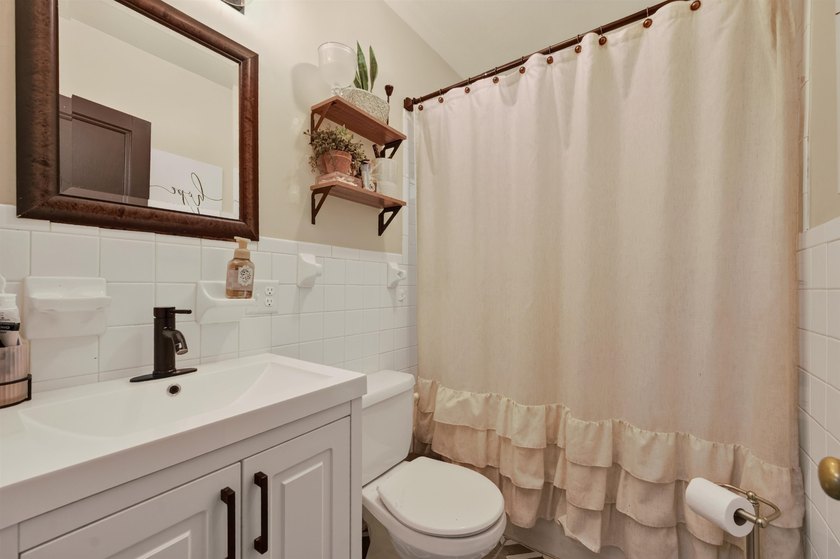 Welcome Home! This charming 1.5-story bungalow is situated on a - photo 37