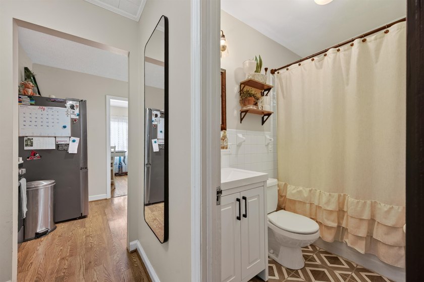 Welcome Home! This charming 1.5-story bungalow is situated on a - photo 38