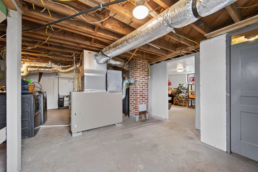 Welcome Home! This charming 1.5-story bungalow is situated on a - photo 40