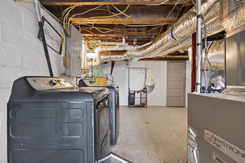 Welcome Home! This charming 1.5-story bungalow is situated on a - photo 44