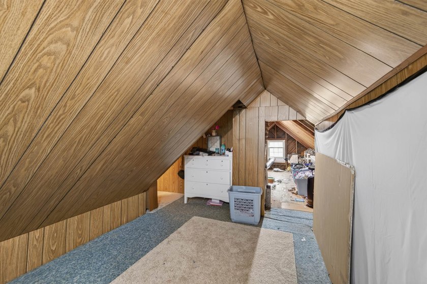 Welcome Home! This charming 1.5-story bungalow is situated on a - photo 50