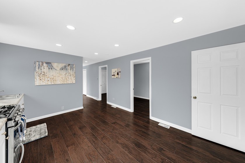Charming, fully-renovated home on awaits! NEW flooring, NEW - photo 12