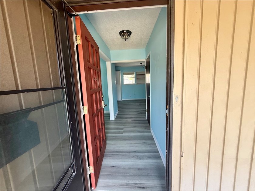 Welcome to this conveniently located 3-bedroom, 2-bath home - photo 3
