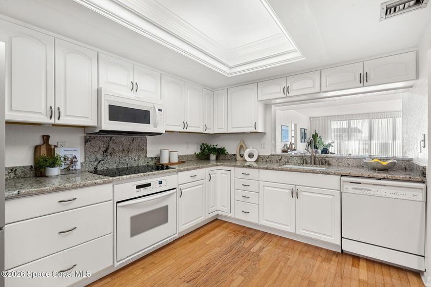 Discover the luxury of this 7th-floor corner oceanfront condo in - photo 13