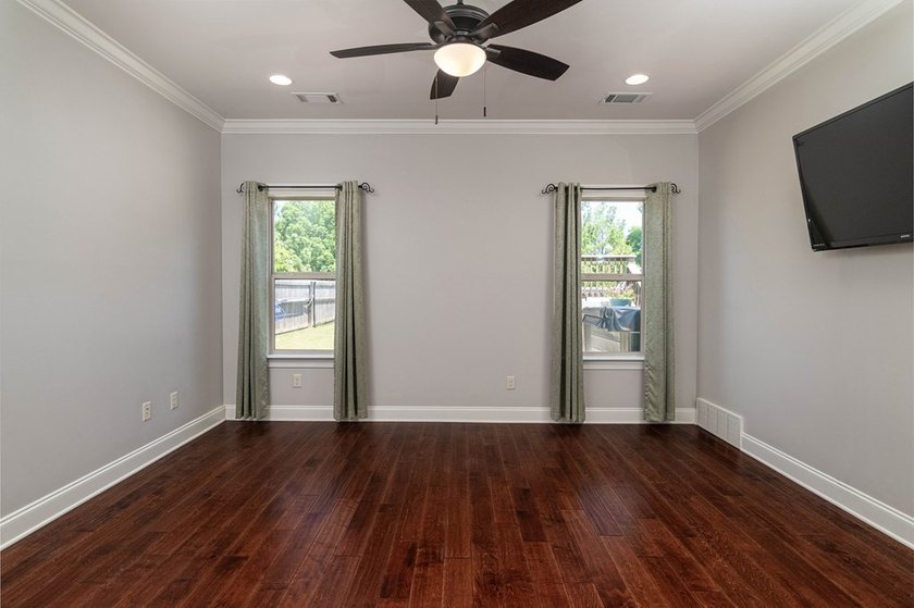 Tucked into The Lakes subdivision on 1.9 acres that includes - photo 11