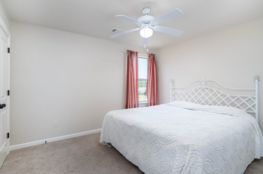 Tucked into The Lakes subdivision on 1.9 acres that includes - photo 16