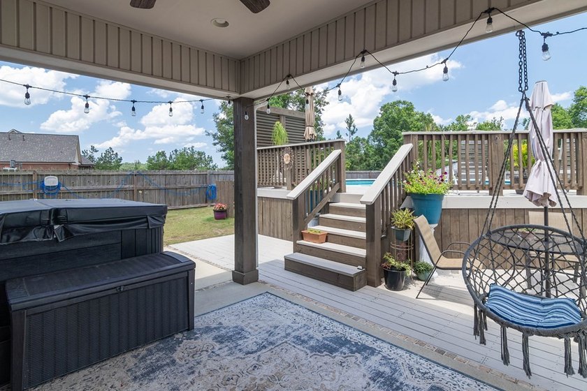 Tucked into The Lakes subdivision on 1.9 acres that includes - photo 22