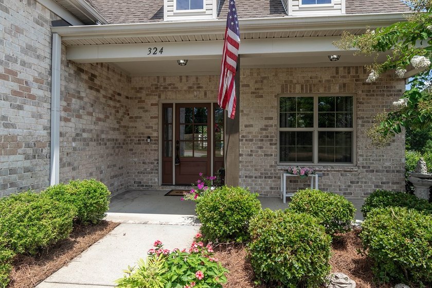 Tucked into The Lakes subdivision on 1.9 acres that includes - photo 29