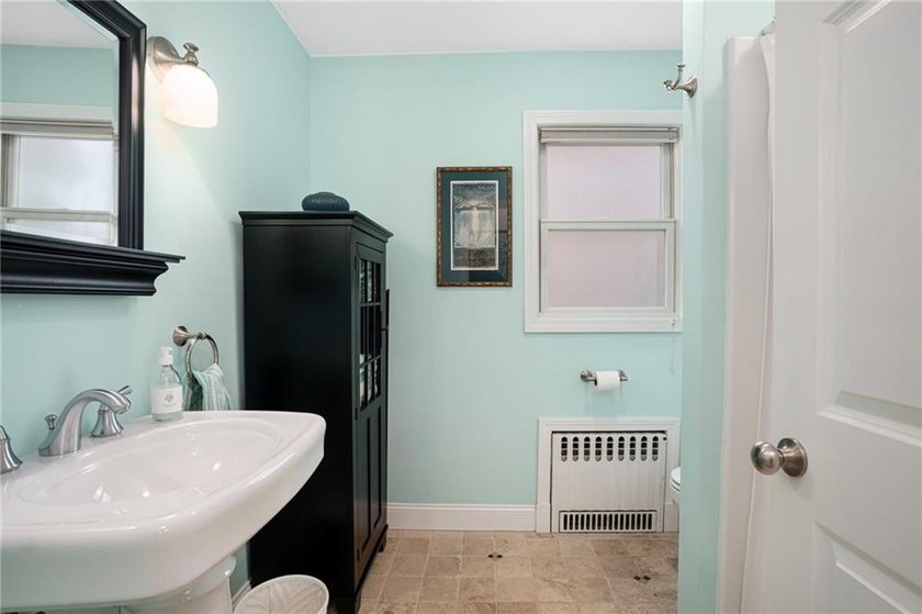 Welcome to this charming move-in ready Cape located in Newport's - photo 17