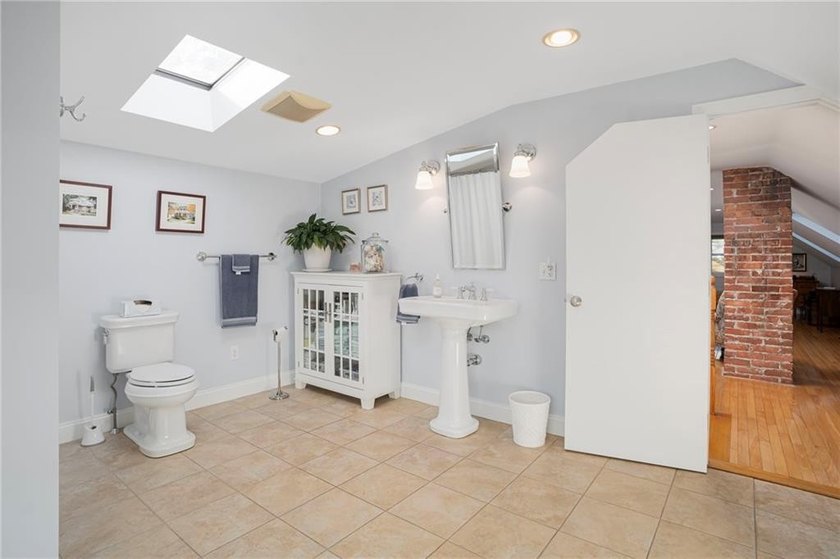 Welcome to this charming move-in ready Cape located in Newport's - photo 24