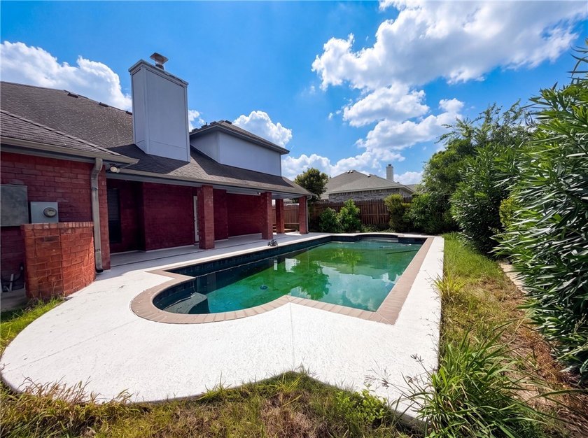 This Corpus Christi two-story home offers a patio, and a two-car - photo 8