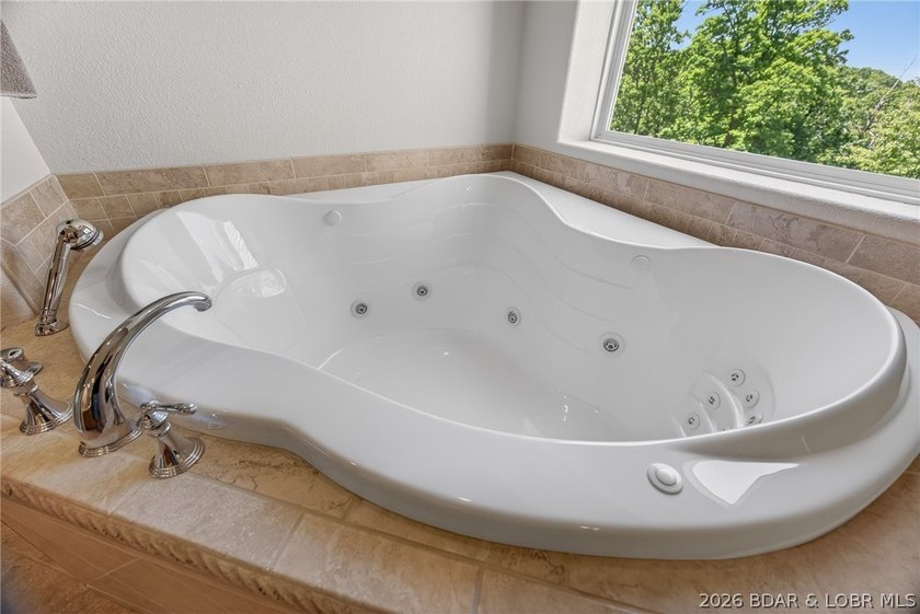 Ranch-style home in Linn Creek offers easy one-level living - photo 36