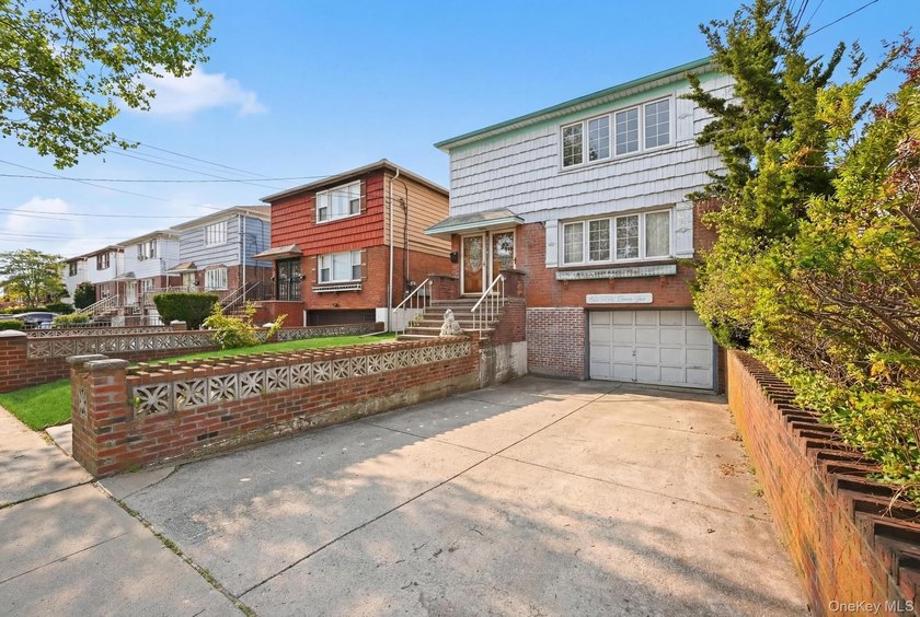 Beutifully Renovated 2 Family High Ranch, 6 Bedrooms, 4 Full - photo 3