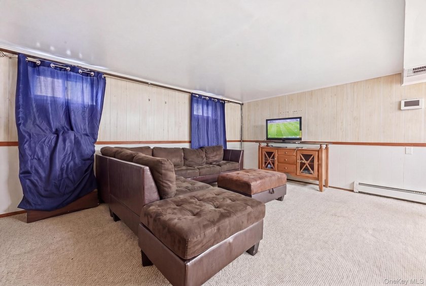 Beutifully Renovated 2 Family High Ranch, 6 Bedrooms, 4 Full - photo 9