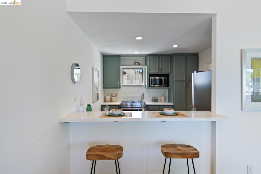 A beautifully updated reverse floor plan condo offering an - photo 19