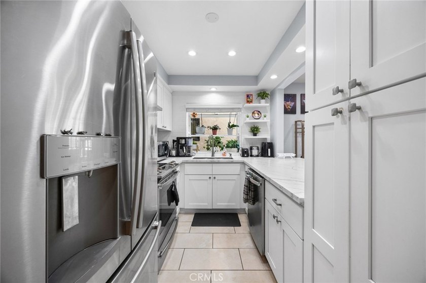 Rare first-floor end-unit condo with no common walls, located in - photo 11