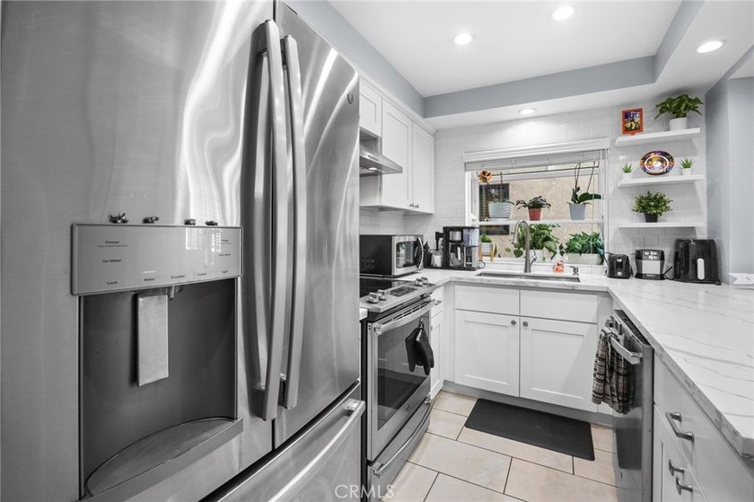 Rare first-floor end-unit condo with no common walls, located in - photo 12