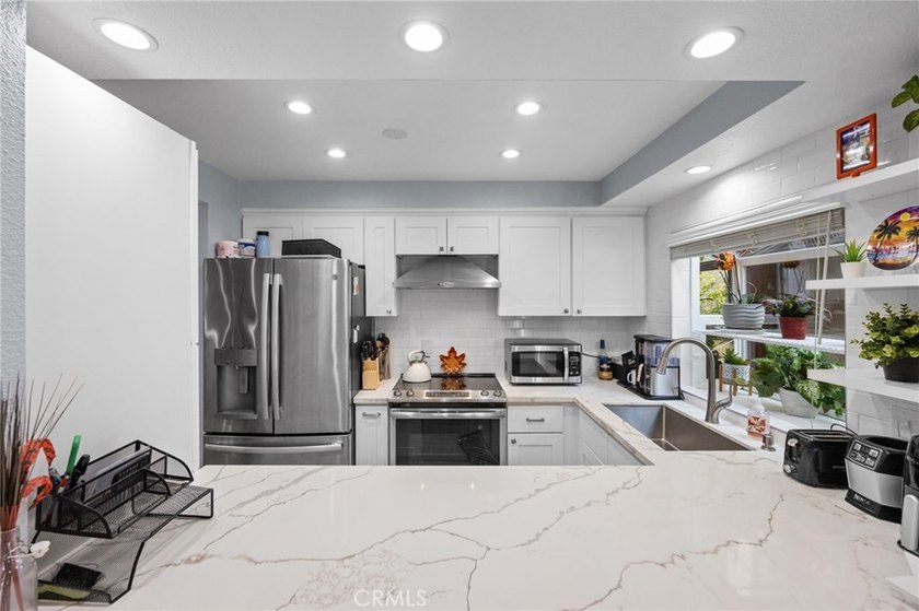 Rare first-floor end-unit condo with no common walls, located in - photo 13