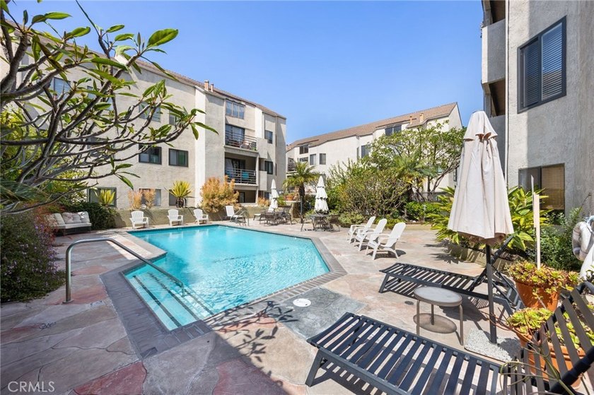 Rare first-floor end-unit condo with no common walls, located in - photo 32