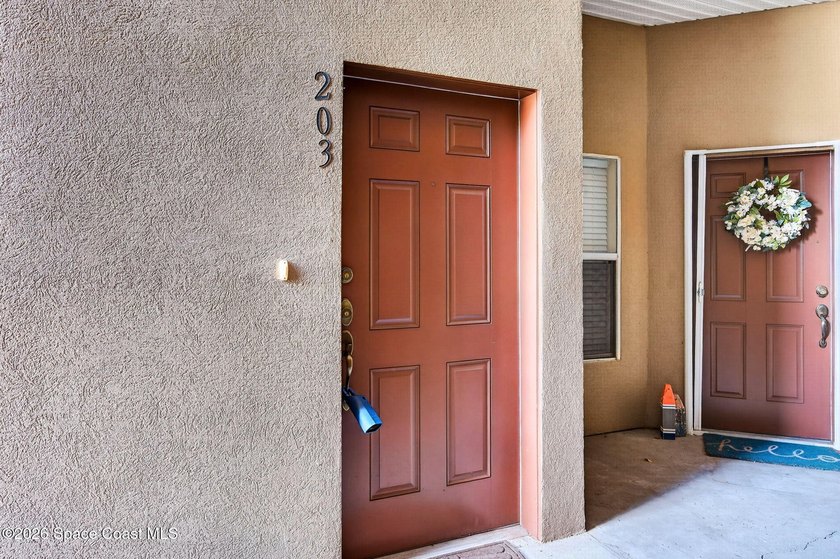 Check out this BEAUTIFULLY MAINTAINED condo that is centrally - photo 3