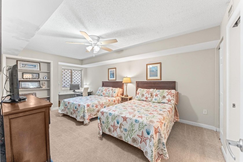Welcome to this spacious 4-bedroom, 4-bath residence in the - photo 15