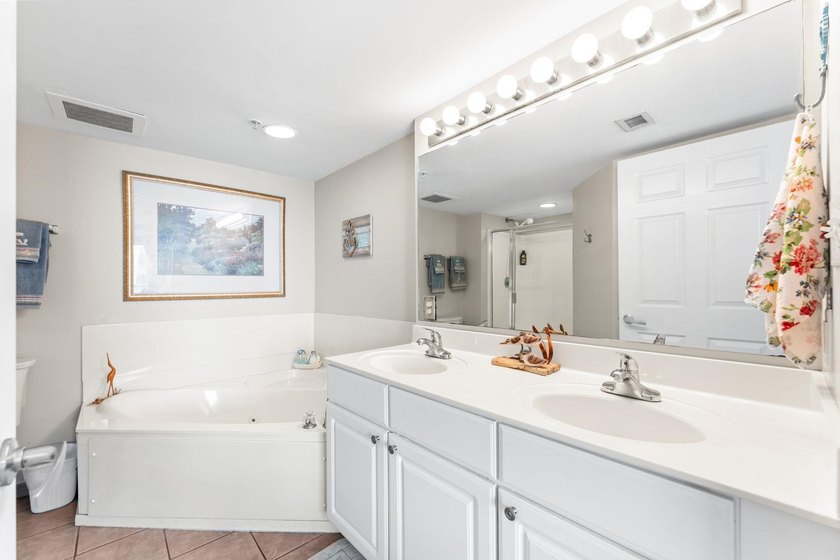 Welcome to this spacious 4-bedroom, 4-bath residence in the - photo 20