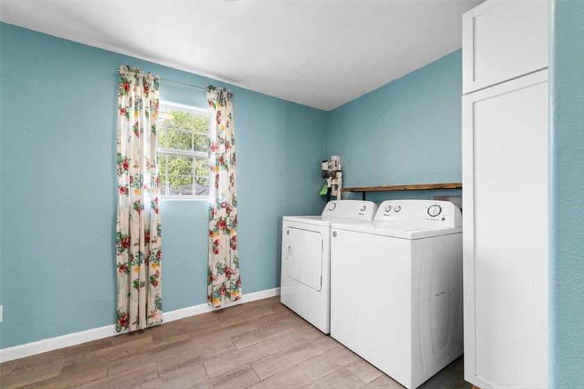 Situated on a spacious 0.31-acre lot in Flour Bluff, this - photo 6