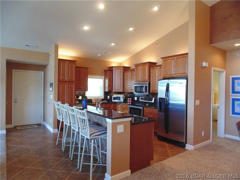 LUXURY SUMMER PLACE CONDO at Lake of the Ozarks - TURNKEY! This - photo 24